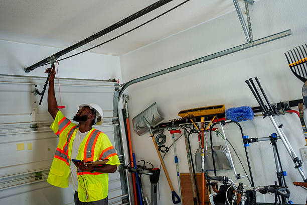 Professional Garage Door Panel Replacement technician working in New Hampton, IA